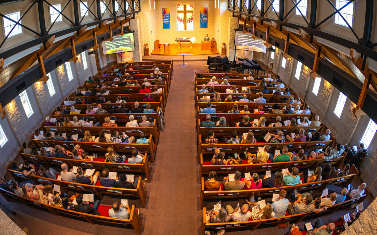 A congregation leadership team in conversation after a service